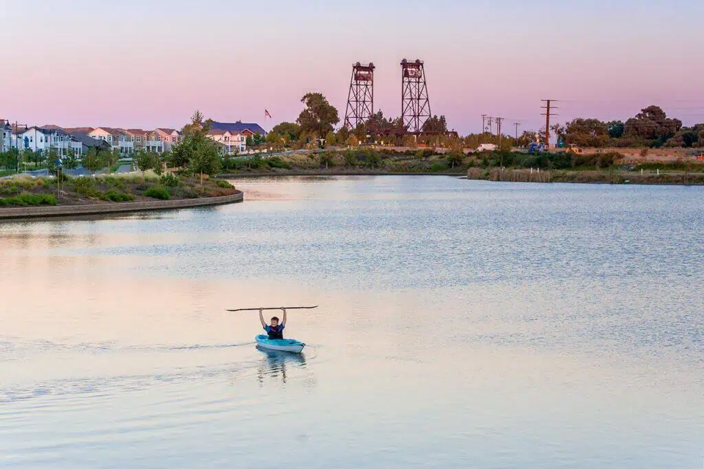 mankayakingonlakeatriverislandswebgeo River Islands man kayaking on lake at river islands