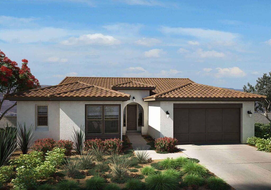 front of off white house with red roofing and brown garage