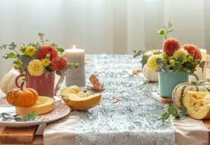 RIBlogFallDecor20230926FallTable720 River Islands autumn table setting with candles 3780226789590045 12132193629810645
