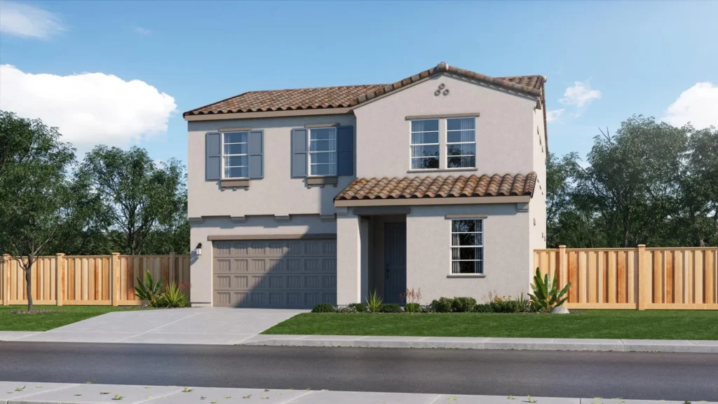 Two story beige stucco house with a tiled roof blue shutters and a double garage bordered by a wooden fence and green lawn