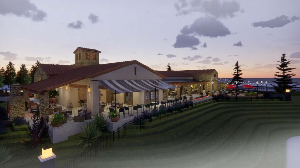 Lakeside restaurant terrace with striped awning outdoor seating and stone buildings at sunset by the sea
