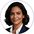 Professional headshot of a woman with shoulder length dark hair wearing a navy blazer and white blouse smiling